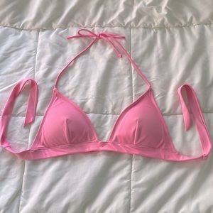 Victoria’s secret pink bathing suit. Worn but in great condition